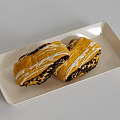 Two Delicious Glazed Pastries With Dark Filling On White Rectangular Plate