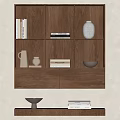 Wooden Shelf Unit with Multiple Compartments Holding Books Vases and Bowls and Lower Shelf