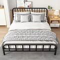 Modern Double Bed with Black Metal Frame Striped Quilt Pillows Bedside Table Lamp and Plant
