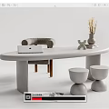 Modern White Oval Desk Featuring Laptop Vase Dried Flowers Gray Chair and Round Stools