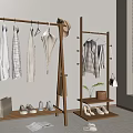 Wooden Clothes Rack With Hanging Clothes Hat Shoes Bag And Plant In Indoor Space
