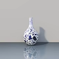 Blue And White Ceramic Vase With Intricate Floral Patterns On Gray Surface
