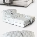 Double Bed with White Tufted Headboard Brown Quilted Comforter and Plaid Fringe Blanket