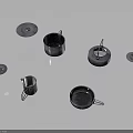 Scattered Metal Household Items Including Mugs And Plates On Dark Background