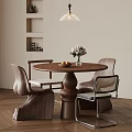 Modern Dining Room With Round Wooden Table Chairs Pendant Light And Herringbone Floor