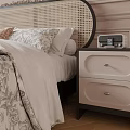 Double Bed With Rattan Headboard Brown Blanket Sunflowers Alarm Clock And Nightstand Room Decor