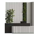 Modern Reception Desk Area With Potted Plant And Vertical Green Wall Design