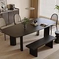 Modern Black Dining Table Set With Wicker Back Chairs Bench And Potted Plant