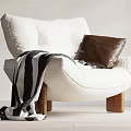 White Single Sofa Featuring Brown Leather Pillow Black And White Striped Blanket And Wooden Legs