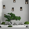 Zen Inspired Garden with White Walls Square Candle Niches Bonsai Tree Stones and Round Greenery