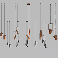 Multiple Modern Pendant Lights With Stylish Designs Glowing In Dark Background