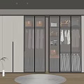 Modern Walk in Closet Interior With Glass Doors Hanging Clothes And Built in Lighting