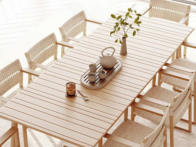 Natural Wooden Outdoor Table with Woven Chairs Vase Green Plant Teapot Tray and Teacups 3d model