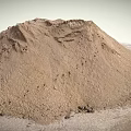 Ancient Earth Mound With Rugged Surface Ridges And Small Entrance On Sandy Ground