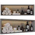 Stylish Bathroom Accessories With Rolled Towels Reed Diffusers Candles And Bottles On Shelf