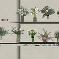 X DDRSF Lit Shelves With Flower Vases And White Pink Green Flowers On Marble Countertop