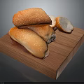 Fresh Sesame Seed Bread Rolls on Wooden Cutting Board with Sliced Pieces