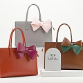Fashionable Handbags In Various Colors With Bowknots And New Arrival Tag