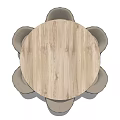 Round Wooden Dining Table Set With Six Brown Padded Chairs And Metal Mesh Legs