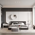 Modern Bedroom Interior Design With Black Bed Round Wall Art Area Rug And Accent Chair