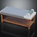 Massage Bed With Wooden Frame Gray Mattress Rolled Towel And Storage Shelf