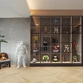 Modern Interior With Transparent Glass Door Display Cabinet Showcasing Toys And Models And Astronaut Sculpture