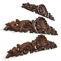 Artistic Dark Wood Carvings Showcasing Intricate Shell Shapes And Scrollwork Patterns