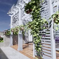 Rooftop Garden Design With Gray Stone Walls White Pergola Wooden Deck And Colorful Flowers