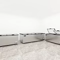 Three Stainless Steel Chest Freezers in White Room with Marble Floor and Open Lid