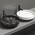 Modern Round Wall Mounted Black And White Marble Washbasins With Black Brackets On Gray Countertop