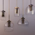 Modern Pendant Lights With Transparent Glass Shades And Metal Bases For Interior Decor