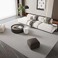 Modern Living Room Interior With White Sofa Pillows Round Coffee Table Rug And Green Plant