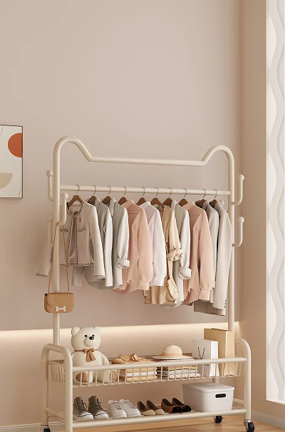 Living Room With Beige Walls White Clothing Rack Light Colored Clothes And Orange Circle Artwork 3d model