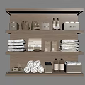 Organized Bathroom Shelf with Neatly Rolled Stacked Towels and Storage Boxes