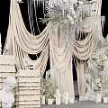 Elegant Wedding Photo Spot With White Drapery Decorative Chandeliers Fresh Flowers Candles And Cake Tower