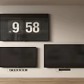 Three Wall Mounted Televisions With Top Screen Time And Bottom Black Screens On Wooden Floor