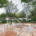 Children's Play Area with Trees and Lawn Slide and Circular Play Space on Paved Surface