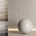 Terrazzo Wall With Color Swatches Display And Decorative Sphere In Various Tones