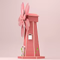 Pink Windmill House With Petal Blades Red Body Windows Door And Small Base Plants