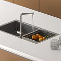 Modern Kitchen Stainless Steel Sink With Faucet Drainer Basket And Fresh Fruits On Counter