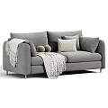 Beige And Gray Upholstered Sofa Interior With Pillows Blanket And Pom Poms