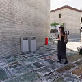 Traditional Commercial Street With Wooden Structure Circular Carved Window And Stone Slab Ground