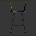 Woven Black and Orange Bar Stools With Black Metal Legs In Dark Background