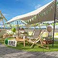 Event Entrance With White Tent Green Flags Swings And Lawn For Fun Activities