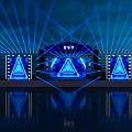 Vibrant Music Festival Stage With Blue Laser Beams Triangular Screens And Lighting Effects