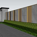 Illuminated Landscape Wall With Concrete And Wooden Slats Along Evening Pathway Trees And Bushes