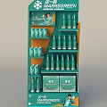 Green Beverage Display Rack With Bottles And Boxed Products In Store