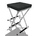 Black Padded Seat Stool With Silver Metal Crossed Legs And Folding Design