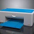 Modern Office Printer In Blue And White With Open Paper Tray For Office Use