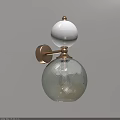 Brass Wall Lamp With White Spherical Top And Textured Transparent Glass Shade